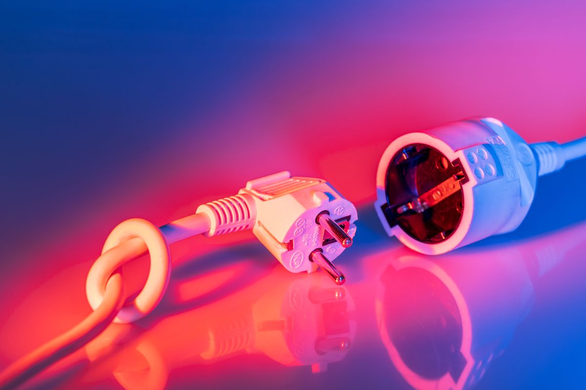 An electric plug and socket close together but not connected, representing a connection Railway refuses until the networking is configured correctly