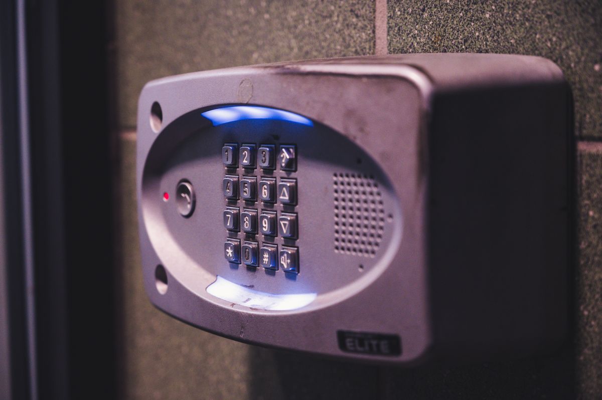 A close-up of an illuminated security keypad mounted on a wall, representing the basic authentication that should sit in front of the Bull Board dashboard before it's exposed publicly