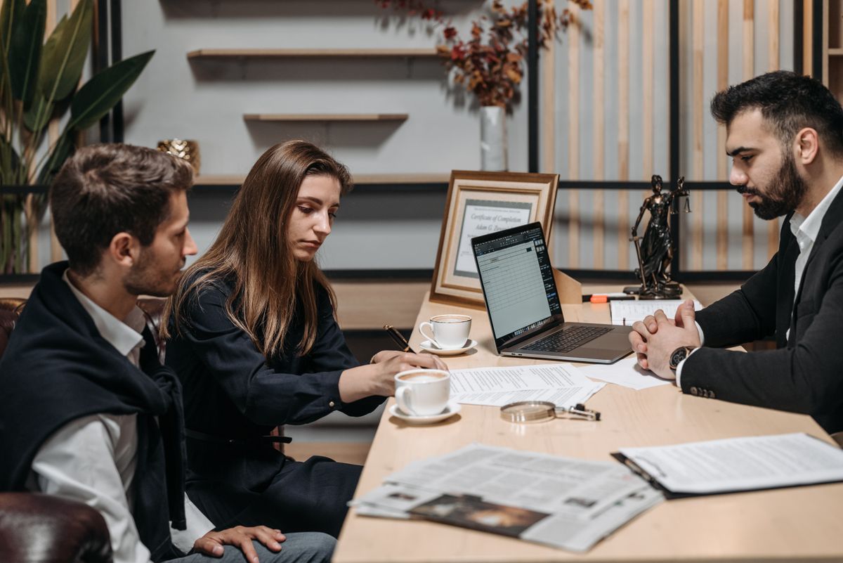Presenting a three-tier SaaS development proposal to a client across the table